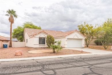 Mediterranean / spanish home with a tile roof, con