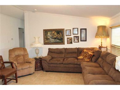 Living Room. Open concept with cathedral ceiling. 
