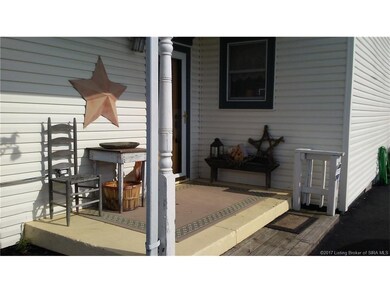 Covered front porch welcomes you to this home.