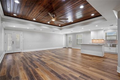French doors leading to patio & yard