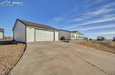 Double gated entrance, crushed asphalt road and co