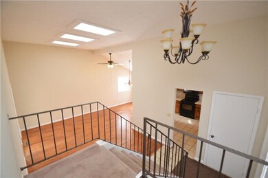 LOOKING FROM THE BEDROOM LEVEL INTO THE ENTRANCE
