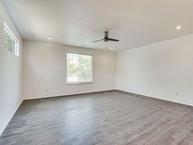 Spare room featuring dark hardwood / wood-style fl