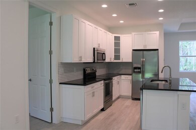 Granite Top and Solid Wood Cabinets in the Kitchen