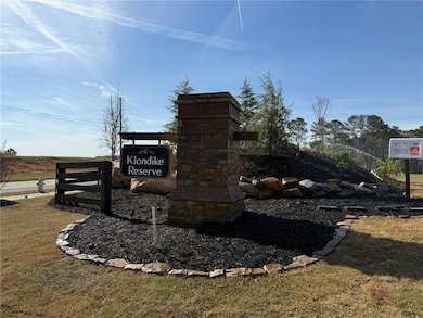 Community sign with a lawn