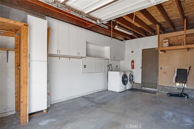 Nice White Cabinets and Very spacious garage