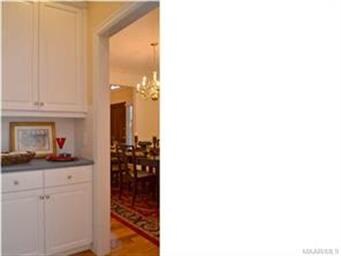 Conveniently located between the kitchen and dinin