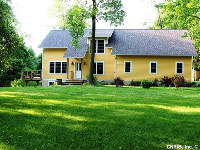 Exterior Front. Nestled in the trees on the St. La