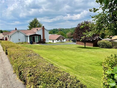 Large side Yard with views of both garages.  The t