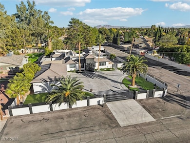 Aerial view of residential area featuring mountains