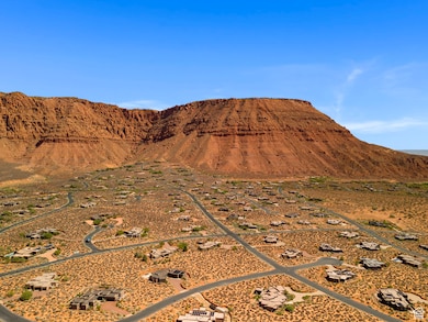 View of mountain backdrop featuring a desert landscape and rural landscape