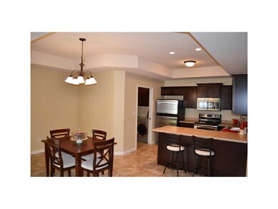 Kitchenette. Upgraded cabinets, breakfast bar, sta