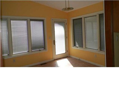 Sunroom with vaulted ceilings