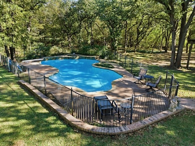 The well-maintained salt water pool is situated conveniently between both residences for easy access.