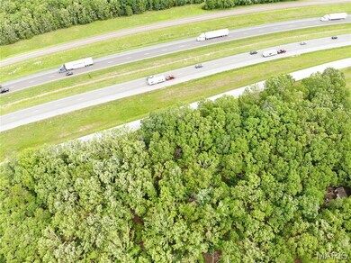 Aerial view of property's location featuring a major roadway