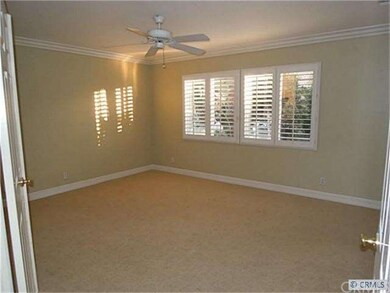 The master with double doors has a separate tub & 