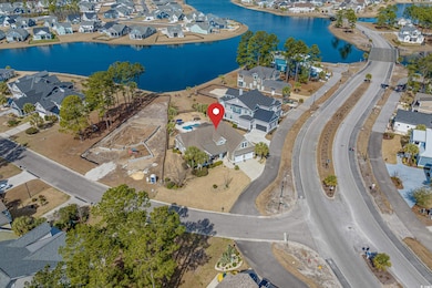 Drone / aerial view with a water view and a reside