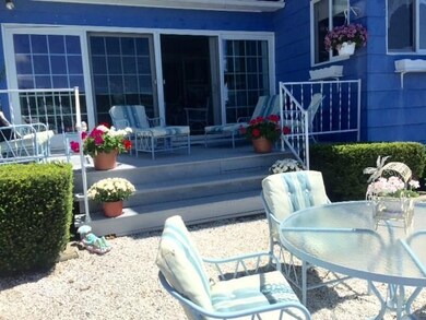 Your patio sits just outside the enclosed sunroom 