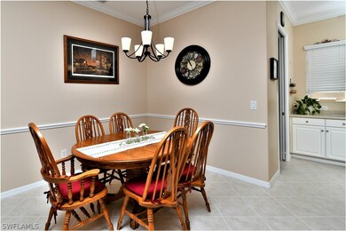 Dining area off of family room and around the corn