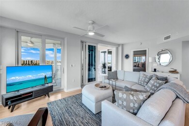 Living area with visible vents, ceiling fan, baseb
