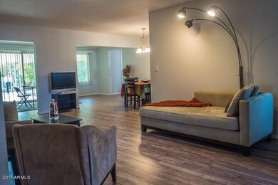 Living Room Opens to Dining and AZ Room