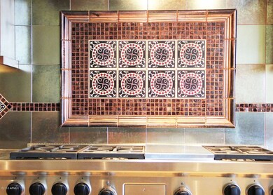 FRAMED  TILED BACKSPLASH IN KITCHEN