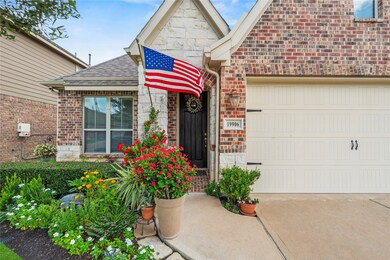 Charming one-story home with a brick/stone elevati
