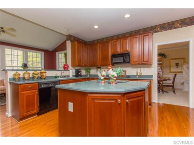 Cherry Stained Cabinets with Island-Hardwood Floor
