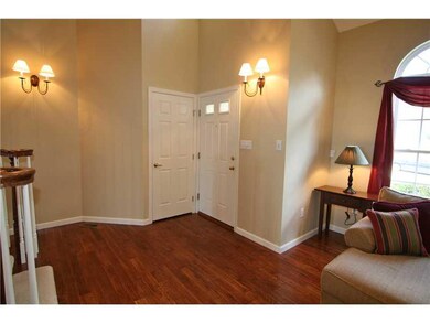 Entry/Foyer. Two-story entry with hardwood floorin