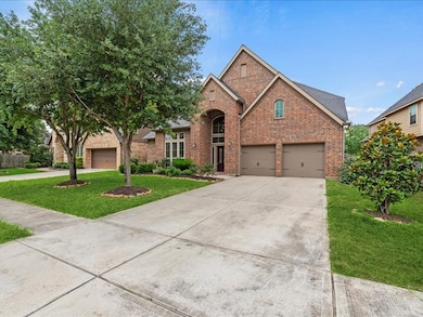 Home features 5 bedrooms, 4 full bathrooms, and 3 Car Tandem Garage.