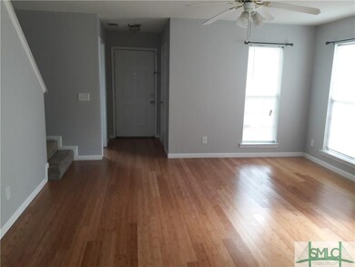great room features bamboo flooring & lots of ligh