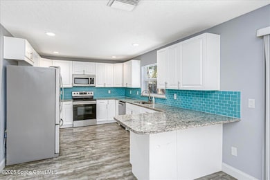 1911 Fabien Cir, Melbourne, FL 32940 - photo 6