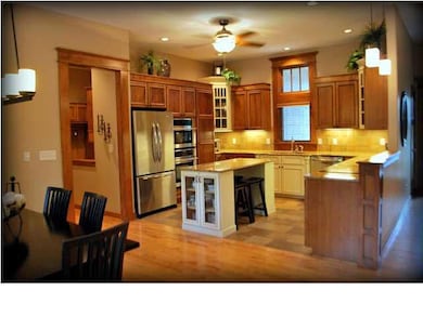 Gorgeous kitchen with granite counter tops, walk-i