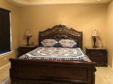 View of tiled bedroom