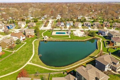 Subdivision waterscape, walking trails and pool.