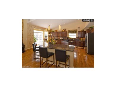Another view of kitchen showing second island with