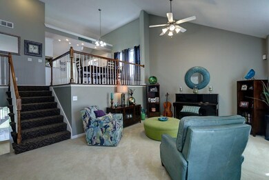 Massive Great Room with vaulted ceilings. Carpets 