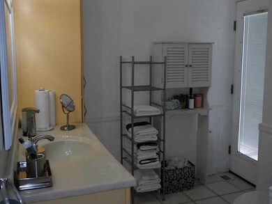 Bathroom. One of three full baths with new fixture