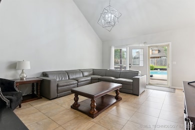 The great room boasts vaulted ceilings and an upda