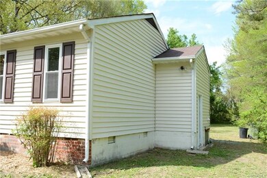 Closer view of exterior attached storage room.