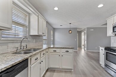 Kitchen looking into breakfast room