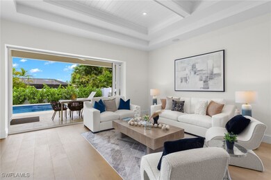 Living room with light hardwood / wood-style floor