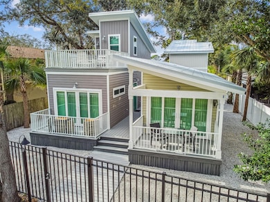 2 Story Rustic Tiny House on Left (1 story Coastal Tiny House on Right)
