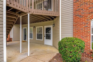 Wonderful covered porch will greet you as you walk towards the condo!