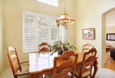 Formal Dining Room with Cathedral Ceilings & Plant