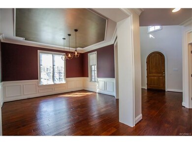 From the foyer entry, the dining room is on one si