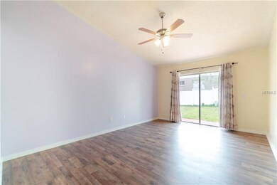 Family room with sliding door access to backyard
