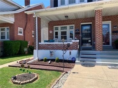 Wide porch and storm door