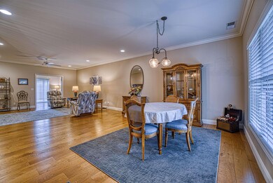 Engineered hardwood floors throughout the living a