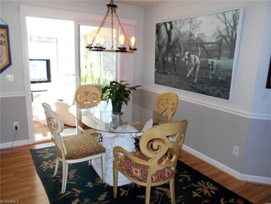 Dining leads to sun room